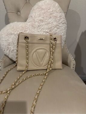 Cream Leather Shoulder Bag with Gold Chain Straps and Embossed Logo